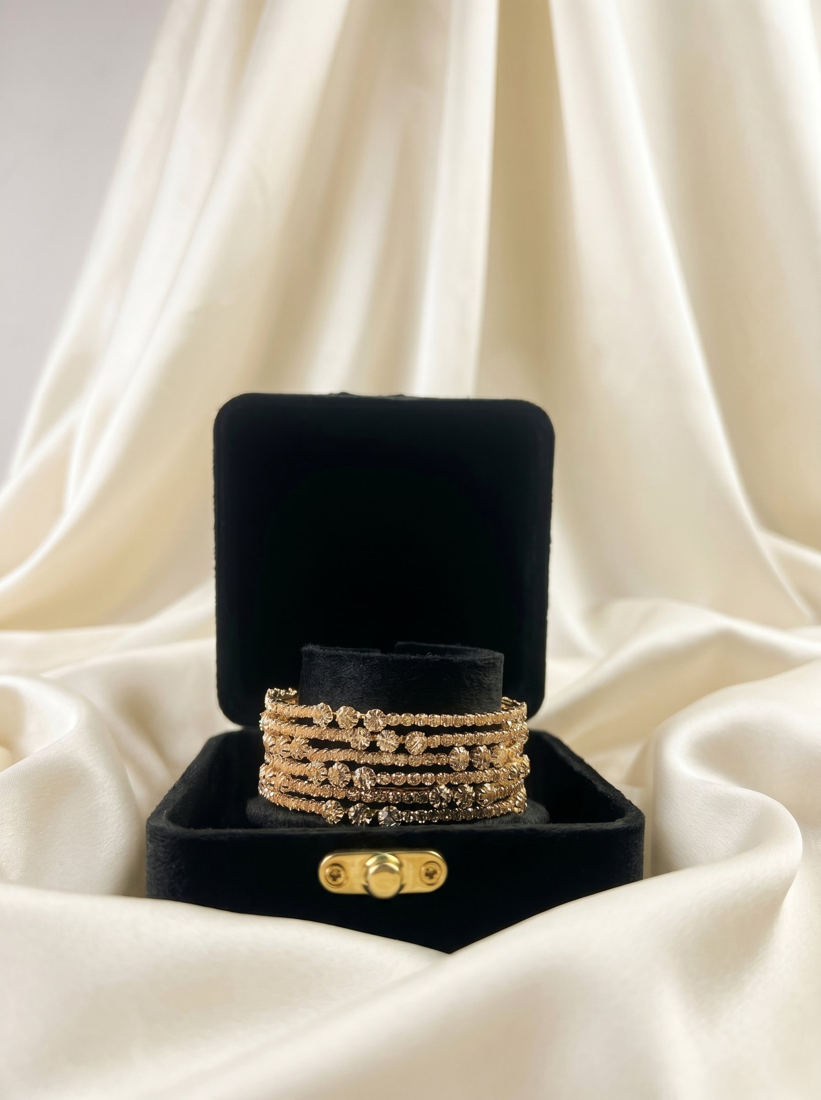 Sparkle with elegance in our Glamorous Rhinestone churiya set, featuring premium skin-toned stones and shimmering crystals. Remarkably lightweight and smoothly finished, it ensures flawless all-day comfort for any festive look.